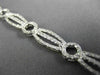 ESTATE WIDE .96CT DIAMOND 14KT WHITE GOLD CLASSIC CIRCLE OF LIFE TENNIS BRACELET