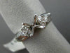 ESTATE .92CT DIAMOND ROUND & BAGUETTE 18KT WHITE GOLD SEMI MOUNT ENGAGMENT RING