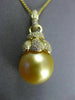 LARGE .60CT DIAMOND & AAA GOLDEN SOUTH SEA PEARL 18KT YELLOW GOLD FLOWER PENDANT