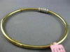 ESTATE .70CT DIAMOND 14KT WHITE & YELLOW GOLD 3D CIRCLE OF LIFE BANGLE BRACELET