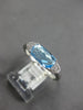 ESTATE 1.22CT DIAMOND & AAA BLUE TOPAZ 14KT WHITE GOLD CUSHION & ROUND FUN RING