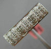 ESTATE .60CT ROUND & PRINCESS DIAMOND 18KT WHITE GOLD RECTANGULAR INVISIBLE RING