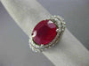 ESTATE LARGE 6.03CT DIAMOND & AAA OVAL RUBY 14KT WHITE GOLD HALO CURVED FUN RING