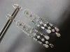 LONG 1.25CT DIAMOND 14KT WHITE GOLD ROUND & BAGUETTE HORSESHOE HANGING EARRINGS