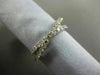 ESTATE .74CT DIAMOND 18KT WHITE & YELLOW GOLD CLASSIC SEMI ETERNITY X LOVE RING