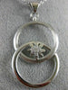 ESTATE LARGE .19CT DIAMOND 18K WHITE GOLD DOUBLE CIRCLE LOVE KNOT FLOWER PENDANT