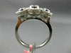 ESTATE .92CT DIAMOND 18KT WHITE GOLD 3 STONE PAST PRESENT FUTURE HALO BEZEL RING