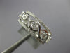 ESTATE WIDE .68CT DIAMOND 18K WHITE GOLD INFINITY SEMI ETERNITY ANNIVERSARY RING