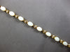 4.6CT DIAMOND & AAA OPAL 14KT YELLOW GOLD OVAL & ROUND ETERNITY BRACELET 28192