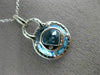 ESTATE LARGE 6.60CT DIAMOND & BLUE TOPAZ 14KT WHITE GOLD HALO ROUND HALO PENDANT