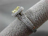 ESTATE 1.89CT GIA FANCY YELLOW DIAMOND 18KT WHITE GOLD HALO ENGAGEMENT RING