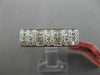 ESTATE .60CT ROUND & PRINCESS DIAMOND 18KT WHITE GOLD RECTANGULAR INVISIBLE RING