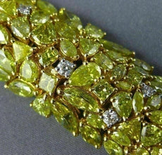 ESTATE MASSIVE 35.46CT WHITE & FANCY YELLOW DIAMOND 18KT WHITE GOLD 3D BRACELET