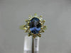 1.83CT DIAMOND & AAA OVAL TANZANITE 14KT YELLOW GOLD FLOWER HALO ENGAGEMENT RING