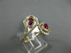 ESTATE .87CT DIAMOND & AAA RUBY 14K ROSE GOLD PEAR SHAPE FLOWER CRISS CROSS RING