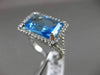 ESTATE 11.42CTW DIAMOND & AAA EMERALD CUT BLUE TOPAZ 14KT WHITE GOLD HALO RING