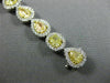 ESTATE 12.37CT WHITE & FANCY YELLOW DIAMOND 18K 2 TONE GOLD LOVE TENNIS BRACELET