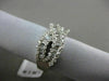 ESTATE 1.99CT BAGUETTE DIAMOND 18KT WHITE GOLD 3D CRISS CROSS INFINITY LOVE RING