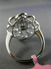 ESTATE LARGE .78CT ROUND & BAGUETTE DIAMOND 18KT WHITE GOLD FLOWER COCKTAIL RING