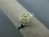 ESTATE WIDE .85CT WHITE & FANCY YELLOW DIAMOND 14K YELLOW GOLD HALO CLUSTER RING