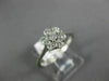 ESTATE .50CT ROUND DIAMOND 14KT WHITE GOLD CLASSIC SEVEN STONE FLOWER LOVE RING