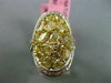 ESTATE MASSIVE 4.10CT INTENSE YELLOW DIAMOND 18KT WHITE & YELLOW GOLD LOVE RING