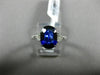 3.07CT TRILLION DIAMOND & OVAL SAPPHIRE 18KT WHITE GOLD 3 STONE ENGAGEMENT RING