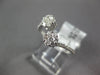 ESTATE WIDE .47CT DIAMOND 18KT WHITE GOLD CLUSTER DOUBLE FLOWER CRISS CROSS RING