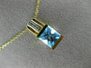 ESTATE 1.46CT DIAMOND & AAA BLUE TOPAZ 14KT 2 TONE GOLD ROUND & PRINCESS PENDANT