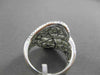 ESTATE 2.15CT BAGUETTE & ROUND DIAMOND 18KT WHITE GOLD INTERTWINNING FUN RING