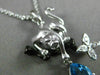 ESTATE .77CT DIAMOND & BLUE TOPAZ 14KT WHITE & BLACK GOLD PANTHER FLOWER PENDANT