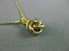 ESTATE SMALL .03CT DIAMOND 14KT YELLOW GOLD 3D FLOATING LOVE KNOT PENDANT #25417