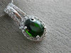 ESTATE 1.54CT DIAMOND & AAA GREEN GARNET 14KT WHITE GOLD 3D OVAL HALO PENDANT