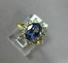 1.83CT DIAMOND & AAA OVAL TANZANITE 14KT YELLOW GOLD FLOWER HALO ENGAGEMENT RING