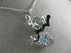 ESTATE .77CT DIAMOND & BLUE TOPAZ 14KT WHITE & BLACK GOLD PANTHER FLOWER PENDANT