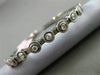 ESTATE .60CT DIAMOND 14KT WHITE GOLD 3D 9 STONE ETOILE FLEXIBLE BANGLE BRACELET