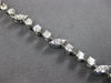 3.15CT DIAMOND 14KT WHITE GOLD 3D ROUND MULTI LEAF BY THE YARD TENNIS BRACELET