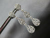 1.57CT DIAMOND 18KT WHITE GOLD 3D CLUSTER INVISIBLE TEAR DROP HANGING EARRINGS