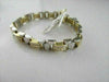 ESTATE WIDE 14K TWO TONE PRINCESS CUT DIAMOND BRACELET