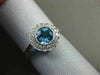 ESTATE WIDE 1.27CT DIAMOND & AAA BLUE TOPAZ 14KT WHITE GOLD HALO ENGAGEMENT RING