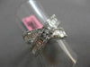 ESTATE 1.12CT ROUND & BAGUETTE DIAMOND 18KT WHITE GOLD CRISS CROSS INFINITY RING