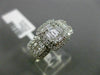ESTATE WIDE .89CT ROUND & BAGUETTE DIAMOND 18KT WHITE GOLD HALO PROMISE RING