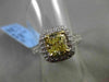 ESTATE 1.89CT GIA FANCY YELLOW DIAMOND 18KT WHITE GOLD HALO ENGAGEMENT RING