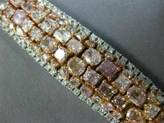 ESTATE LARGE 23.72CT WHITE & PINK DIAMOND 18KT WHITE & ROSE GOLD TENNIS BRACELET