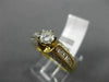 ESTATE 1.20CT ROUND & BAGUETTE DIAMOND 14KT YELLOW GOLD CLASSIC ENGAGEMENT RING