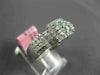 WIDE .76CT DIAMOND 18K WHITE GOLD ROUND & BAGUETTE CLUSTER HALO ANNIVERSARY RING