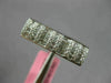 ESTATE .60CT DIAMOND 18KT WHITE GOLD ROUND & PRINCESS INVISIBLE ANNIVERSARY RING
