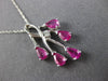 ESTATE 1.27CT DIAMOND & AAA RUBY 14KT WHITE GOLD 6 STONE PENDANT