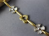 ESTATE .40CT DIAMOND 14KT WHITE & YELLOW GOLD FLOWER HEART LOVE BRACELET #1487