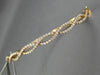 ESTATE WIDE 1.02CT DIAMOND 14KT ROSE GOLD INFINITY SEMI ETERNITY BANGLE BRACELET